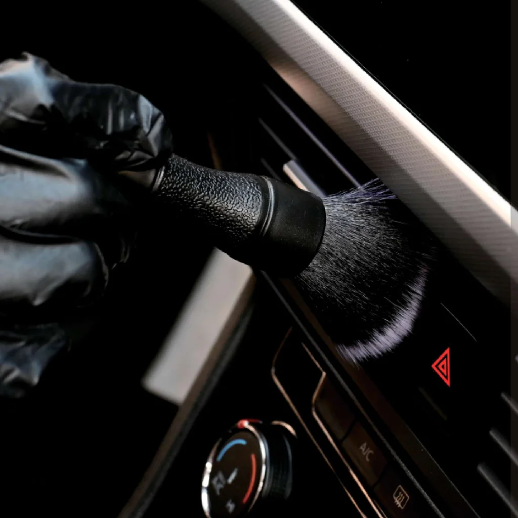 Soft-bristle detailing brush with a textured handle